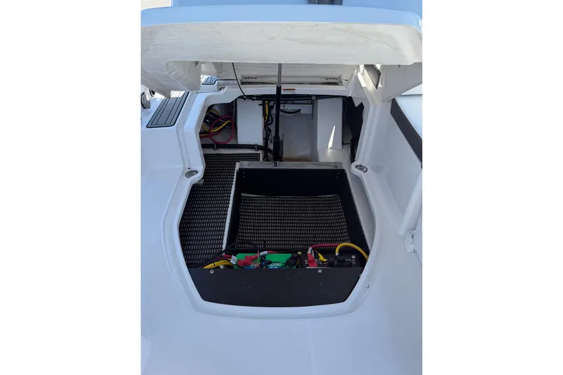 Slide: The Image of Open engine compartment of 2023 Monterey M-45 boat, showcasing internal components and wiring. - 21