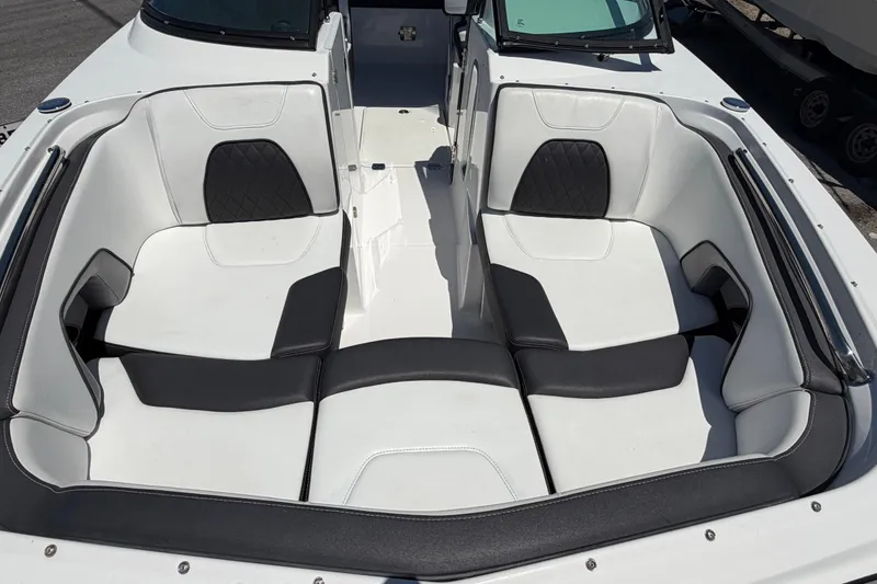 Slide: The Image of 2023 Monterey M-45 boat interior with white and black seating arrangement. - 27