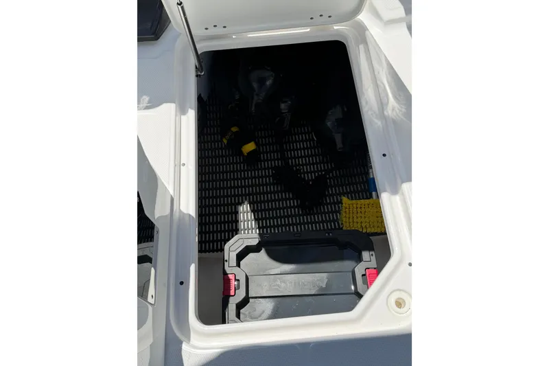 Slide: The Image of Open storage compartment in 2023 Monterey M-45 boat, featuring organized interior space. - 28