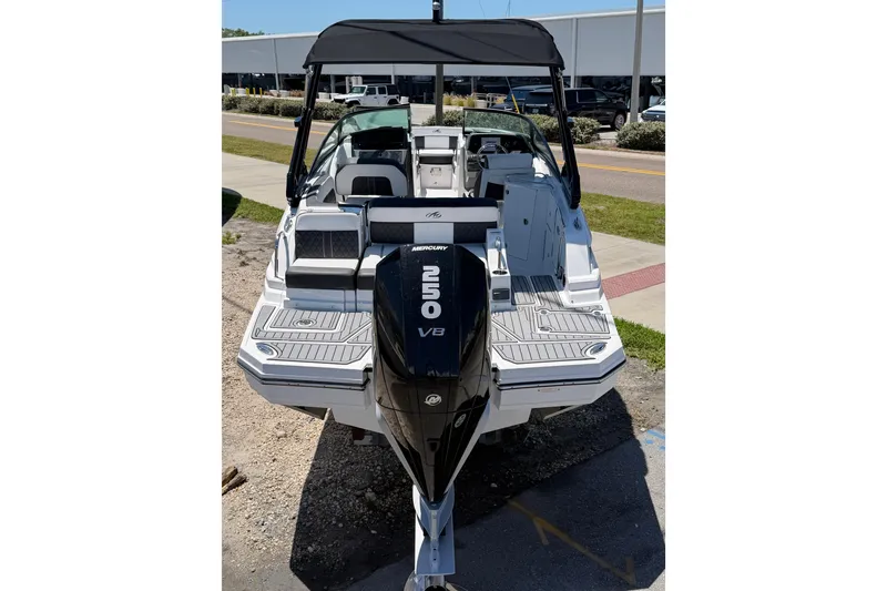 Slide: The Image of 2023 Monterey M-45 boat with Mercury 250 V8 engine, docked outdoors. - 3
