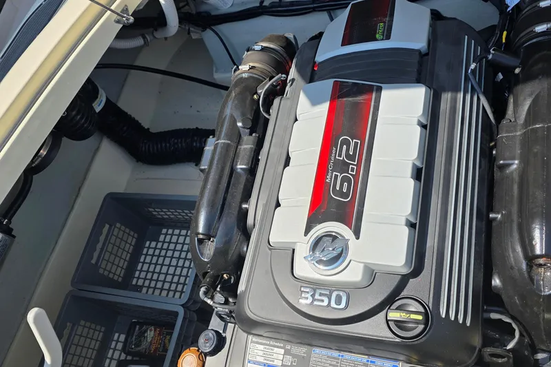 Slide: The Image of Engine compartment of a 2018 Chris-Craft Launch 23 with a 6.2L MerCruiser engine. - 15