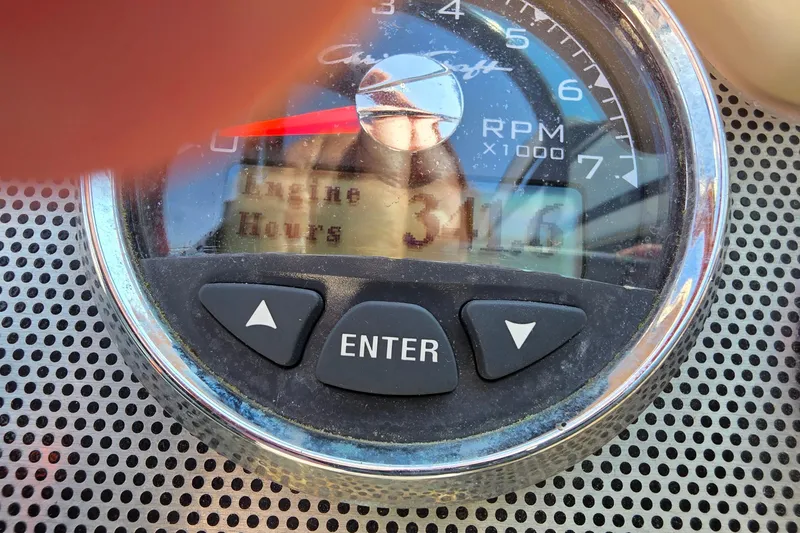 Slide: The Image of Close-up of a 2018 Chris-Craft Launch 23 engine hour meter displaying 341 hours. - 16