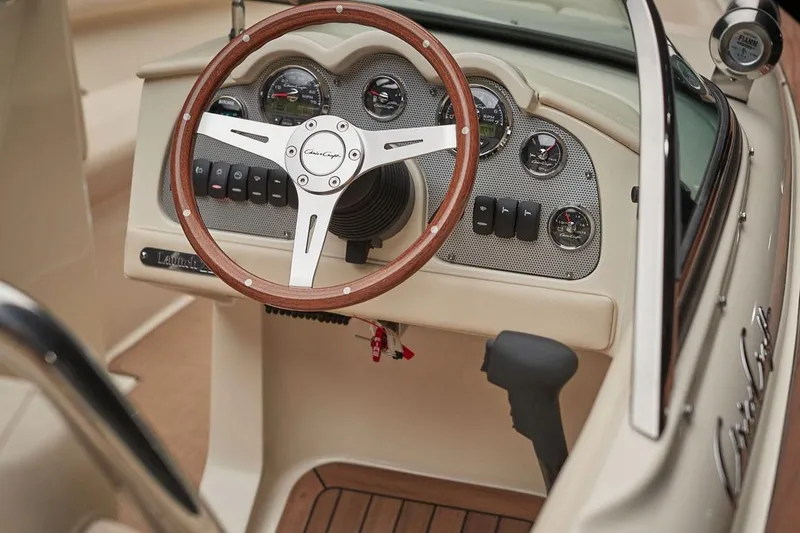 Slide: The Image of 2018 Chris-Craft Launch 23 boat with MerCruiser engine and propeller detail. - 6