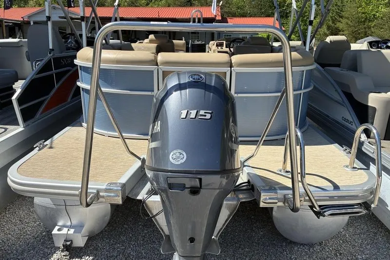 Slide: The Image of 2016 Bennington 22 SSRX pontoon boat with Yamaha 115 outboard motor, rear view. - 6