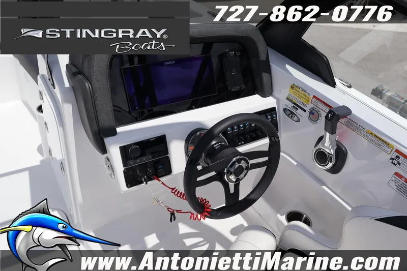 Slide: The Image of 2026 Stingray 20 SBX boat dashboard with steering wheel and controls, featuring Antonietti Marine branding. - 10