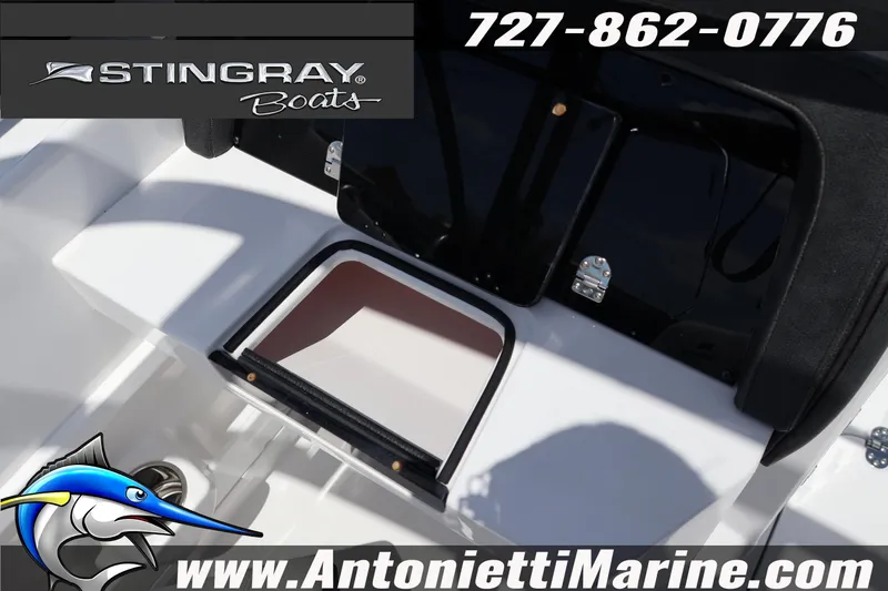 Slide: The Image of 2026 Stingray 20 SBX boat interior with storage compartment, featuring Antonietti Marine branding. - 16
