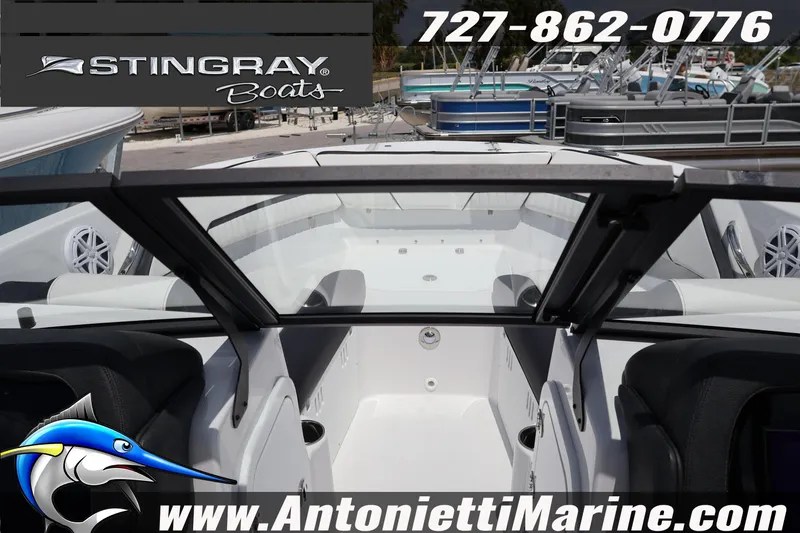 Slide: The Image of 2026 Stingray 20 SBX boat interior at Antonietti Marine dealership. - 17
