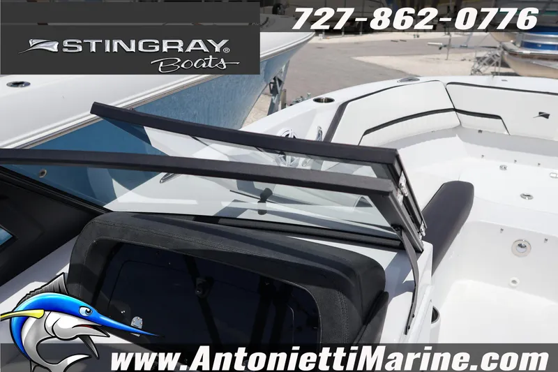 Slide: The Image of 2026 Stingray 20 SBX boat interior with windshield, showcased by Antonietti Marine. - 18