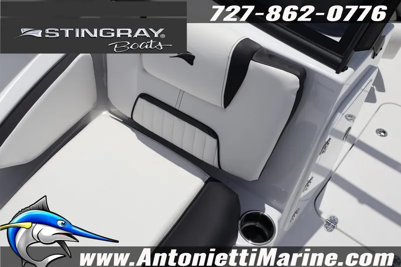 Slide: The Image of 2026 Stingray 20 SBX boat interior with logo and contact details for Antonietti Marine. - 21