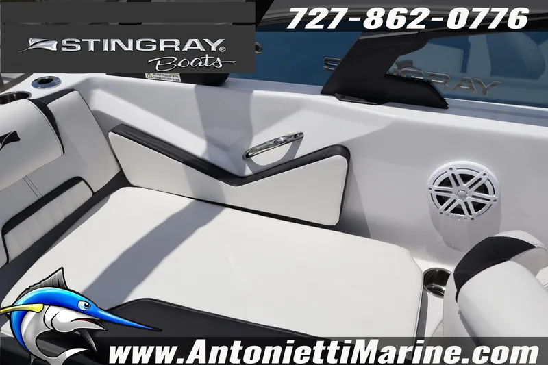 Slide: The Image of Interior view of 2026 Stingray 20 SBX boat with seating and speaker. - 22