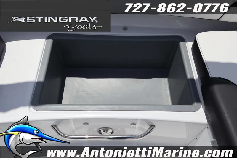 Slide: The Image of 2026 Stingray 20 SBX boat interior with storage compartment, featuring Antonietti Marine branding. - 23