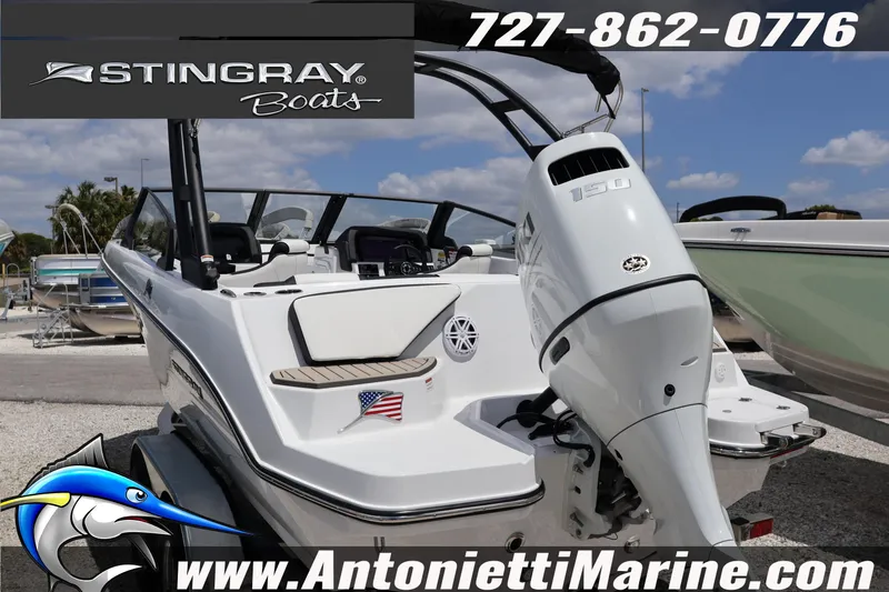 Slide: The Image of 2026 Stingray 20 SBX boat with outboard motor, displayed at Antonietti Marine dealership. - 5