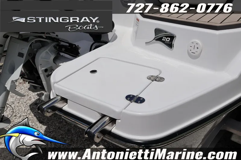 Slide: The Image of 2026 Stingray 20 SBX boat rear view with logo and contact details. - 6