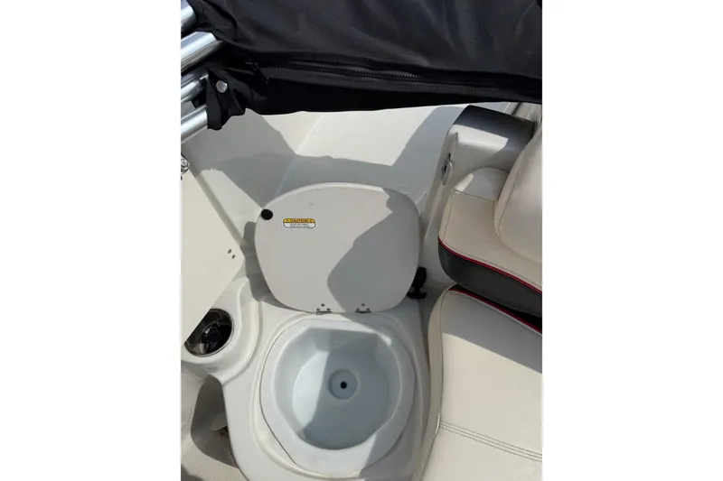 Slide: The Image of 2013 Tahoe 195 I/O boat interior with built-in sink and seating area. - 11