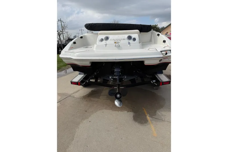 Slide: The Image of Rear view of a 2013 Tahoe 195 I/O boat on a trailer. - 4