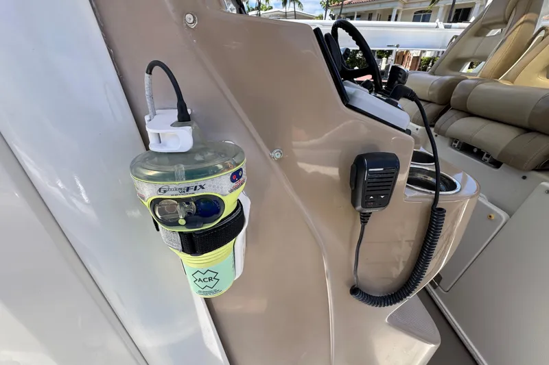Slide: The Image of 2019 Sailfish 360 CC boat console with ACR safety device and communication equipment. - 16