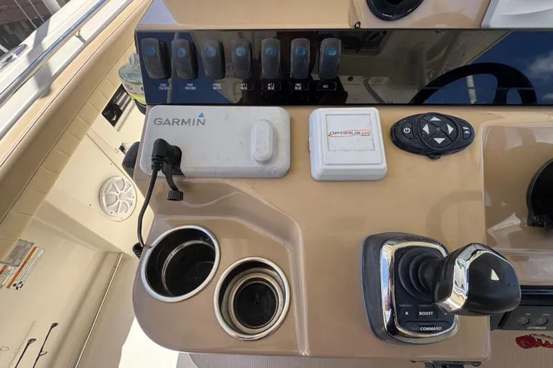 Slide: The Image of Control panel of a 2019 Sailfish 360 CC boat with Garmin and Optimus EPS systems. - 20