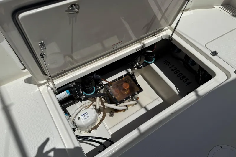 Slide: The Image of Open storage compartment in 2019 Sailfish 360 CC boat. - 46