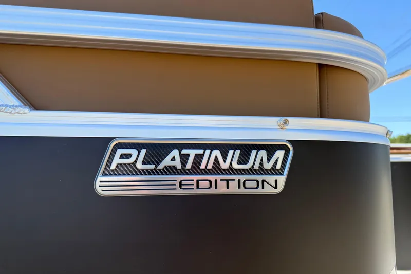 Slide: The Image of 2026 Avalon VENTURE QUAD LOUNGE Platinum Edition badge on sleek exterior. - 10