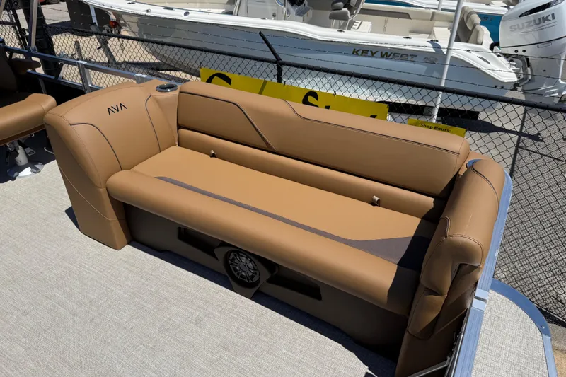 Slide: The Image of Luxurious seating on 2026 Avalon VENTURE QUAD LOUNGE boat, featuring tan upholstery and sleek design. - 12