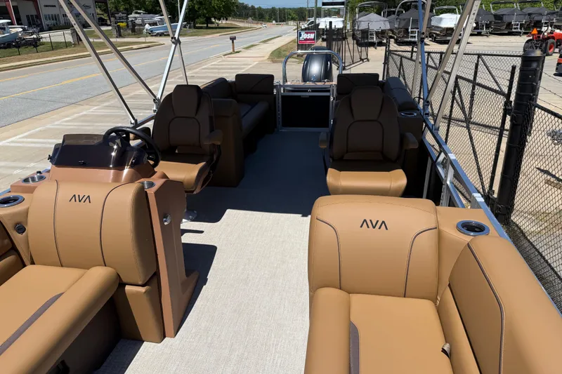 Slide: The Image of 2026 Avalon VENTURE QUAD LOUNGE pontoon boat with tan seating and modern design. - 14