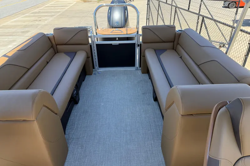 Slide: The Image of 2026 Avalon VENTURE QUAD LOUNGE interior with brown seating and spacious layout. - 17