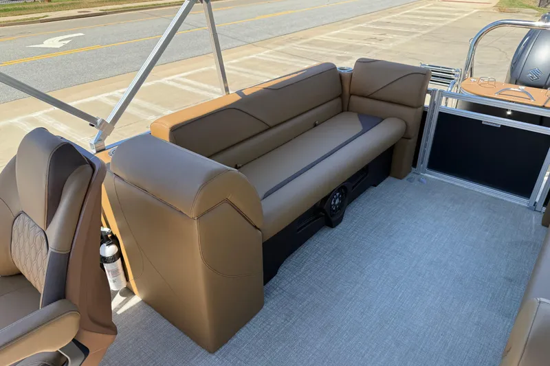 Slide: The Image of 2026 Avalon VENTURE QUAD LOUNGE interior with brown seating and modern design. - 18