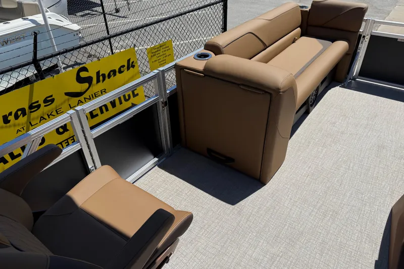 Slide: The Image of 2026 Avalon VENTURE QUAD LOUNGE interior with brown seating, showcasing luxury and comfort. - 21