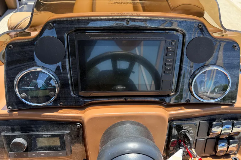 Slide: The Image of Dashboard of 2026 Avalon VENTURE QUAD LOUNGE with Garmin display and gauges. - 25