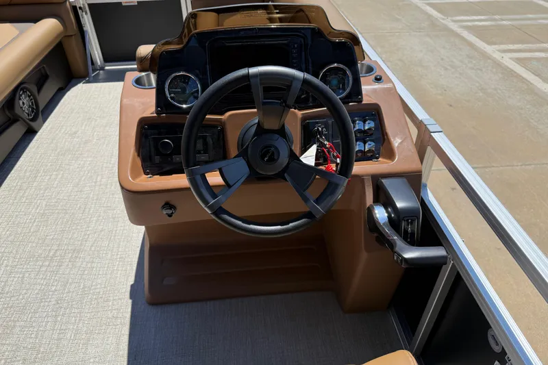 Slide: The Image of Steering console of 2026 Avalon VENTURE QUAD LOUNGE boat with modern controls and dashboard. - 30