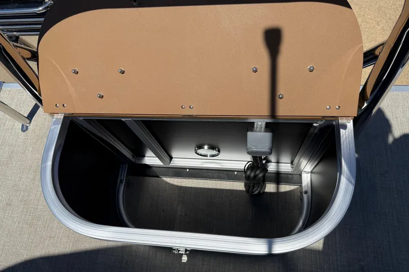 Slide: The Image of Storage compartment of 2026 Avalon VENTURE QUAD LOUNGE boat, featuring sleek aluminum finish. - 34