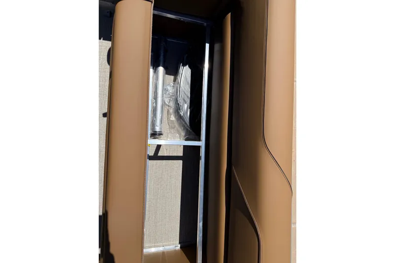 Slide: The Image of Interior view of 2026 Avalon VENTURE QUAD LOUNGE with tan upholstery and metal frame. - 48