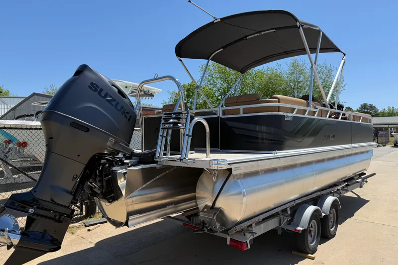 Slide: The Image of 2026 Avalon VENTURE QUAD LOUNGE pontoon boat with Suzuki outboard motor on trailer. - 5