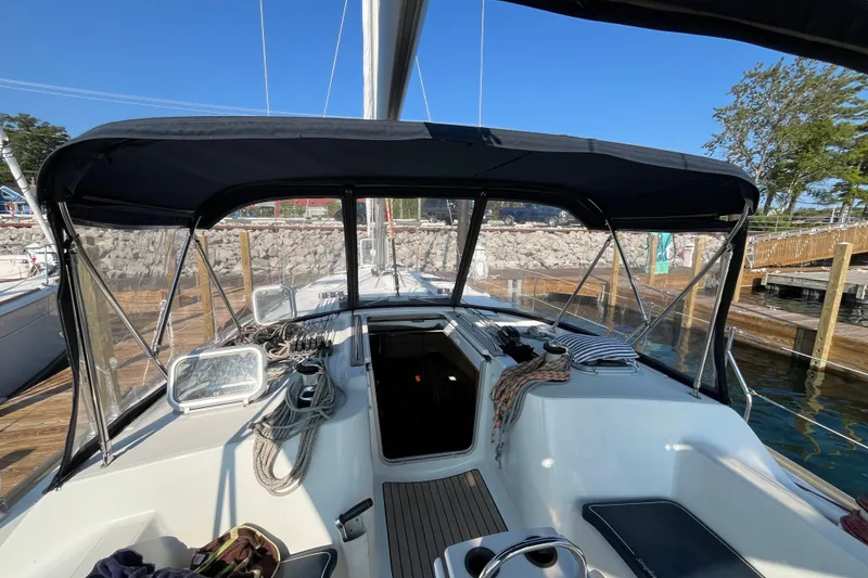 Slide: The Image of Cockpit view of 2005 Jeanneau Sun Odyssey 40.3 sailboat docked at marina. - 17