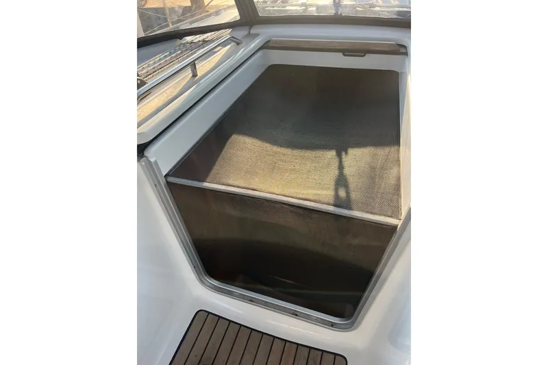 Slide: The Image of Storage compartment on a 2005 Jeanneau Sun Odyssey 40.3 sailboat, featuring a sleek design. - 18
