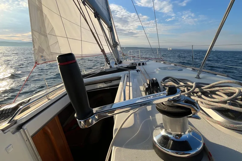 Slide: The Image of Sailing on a 2005 Jeanneau Sun Odyssey 40.3 yacht, with sails unfurled on open water. - 23