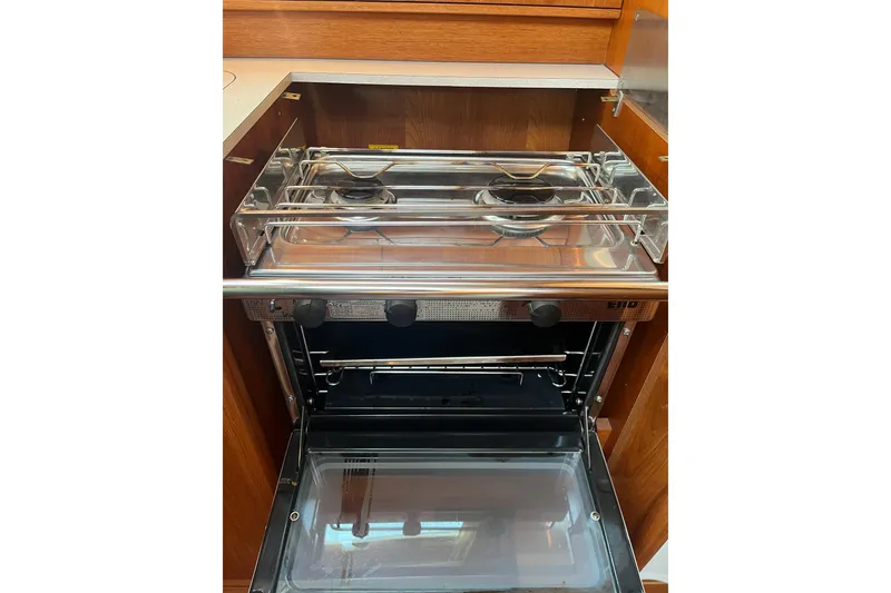 Slide: The Image of Galley stove and oven in 2005 Jeanneau Sun Odyssey 40.3 yacht kitchen. - 30