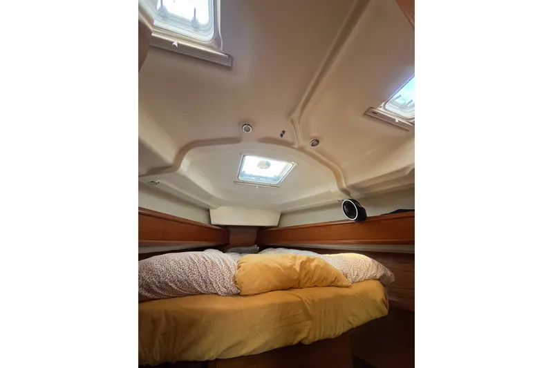 Slide: The Image of Interior cabin of 2005 Jeanneau Sun Odyssey 40.3 sailboat with cozy bedding. - 39