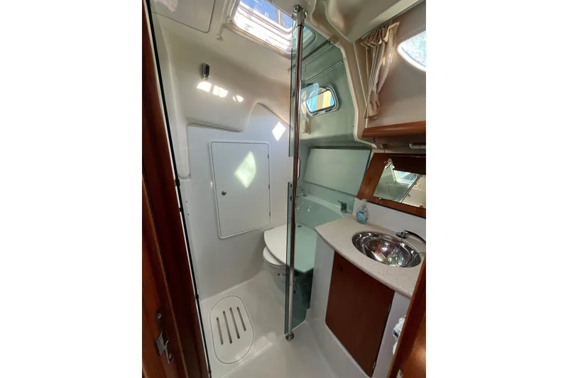 Slide: The Image of Interior of 2005 Jeanneau Sun Odyssey 40.3 yacht bathroom with sink and shower. - 46