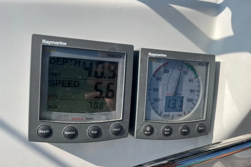 Slide: The Image of Raymarine instruments on Jeanneau Sun Odyssey 40.3, displaying depth, speed, and wind data. - 52