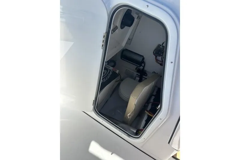 Slide: The Image of Interior view of 2026 Sportsman Heritage 231 Center Console boat cabin. - 11