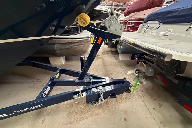 Slide: The Image of 2008 Regal 2700 Bowrider on trailer in storage facility. - 12