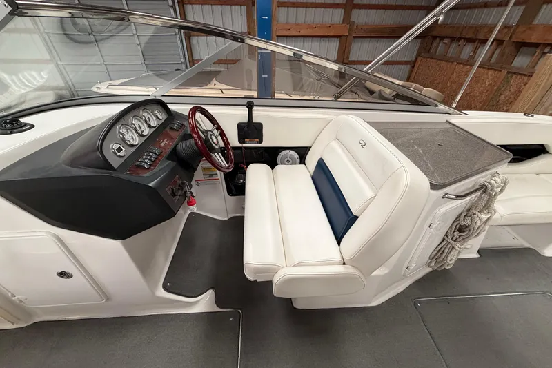 Slide: The Image of 2008 Regal 2700 Bowrider interior with steering wheel and seating area. - 22