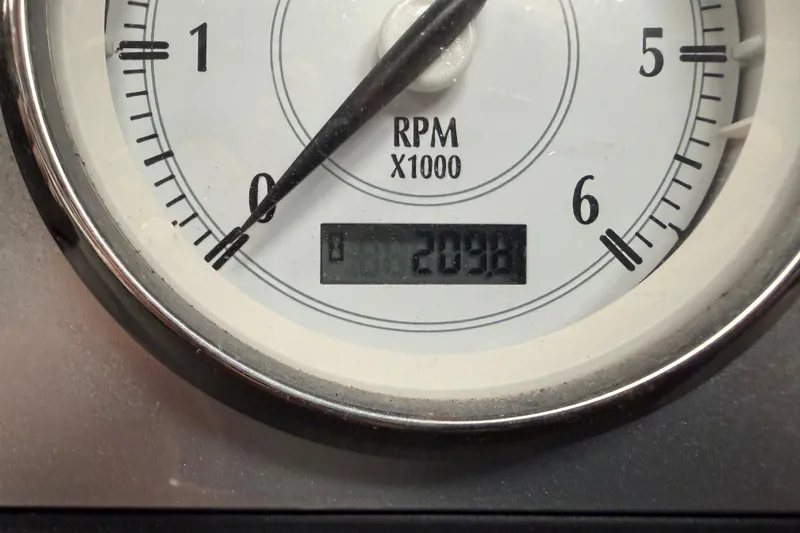 Slide: The Image of Close-up of a Regal 2700 Bowrider 2008 tachometer showing 2098 RPM. - 35