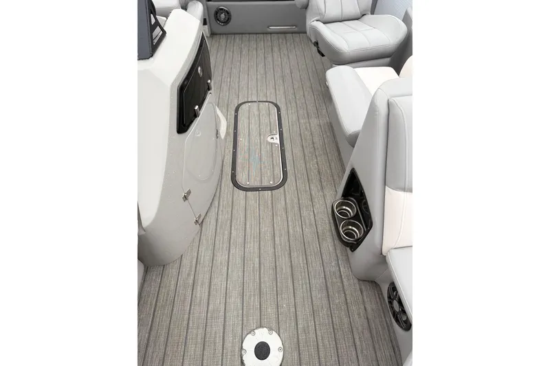 Slide: The Image of Interior of 2022 Manitou 230 Encore SL SHP pontoon boat with gray flooring and seating. - 9