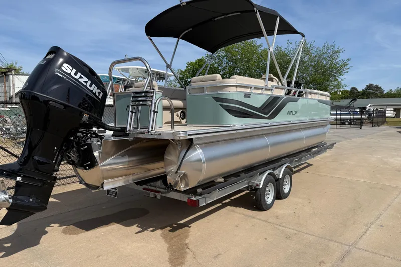 Slide: The Image of 2026 Avalon VENTURE QUAD LOUNGE pontoon boat with Suzuki engine on trailer. - 60