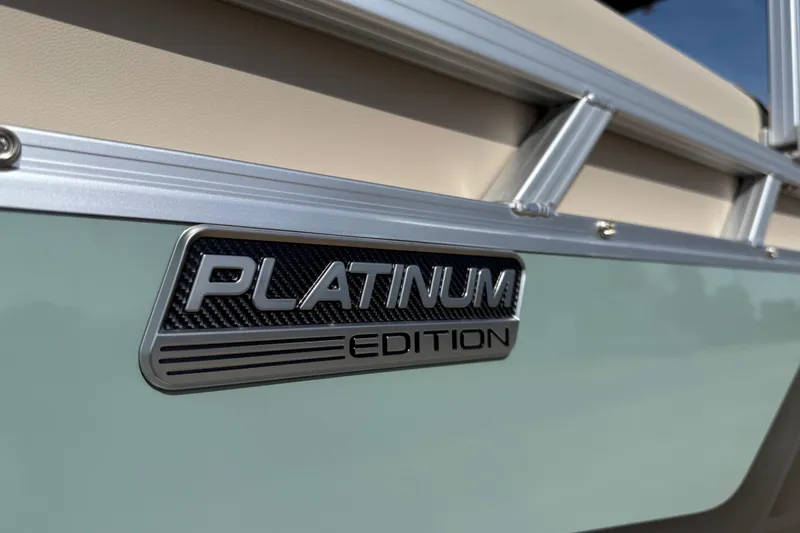 Slide: The Image of 2026 Avalon VENTURE QUAD LOUNGE Platinum Edition badge on sleek exterior. - 61