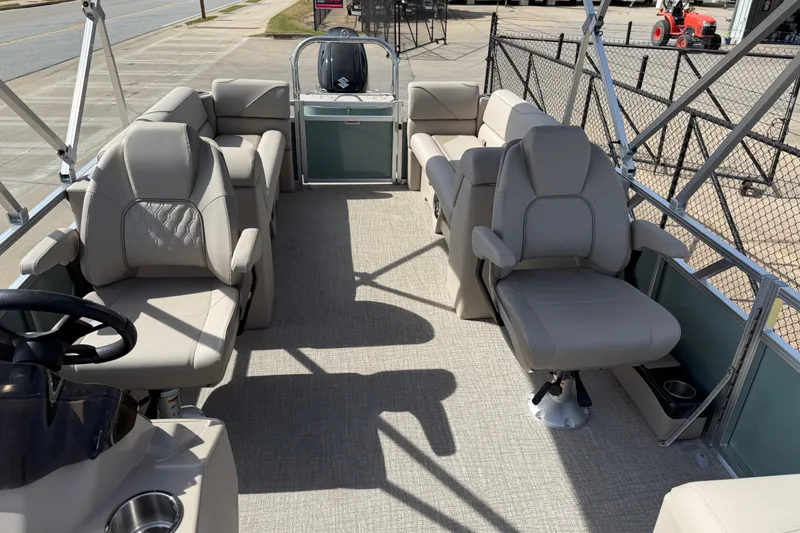 Slide: The Image of Luxurious interior of 2026 Avalon VENTURE QUAD LOUNGE pontoon boat with plush seating. - 66