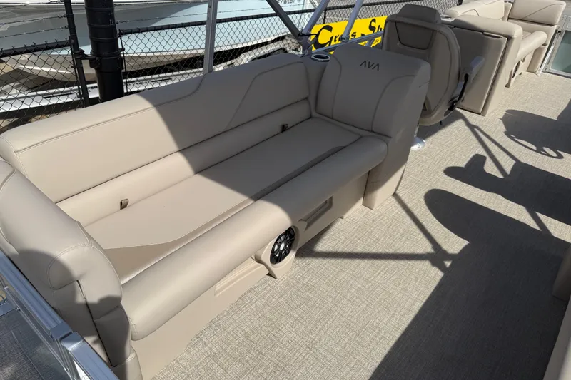 Slide: The Image of 2026 Avalon VENTURE QUAD LOUNGE interior with beige seating and modern design. - 77