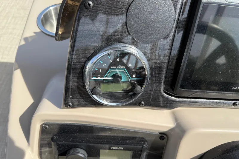 Slide: The Image of Dashboard of 2026 Avalon VENTURE QUAD LOUNGE with RPM gauge and display. - 83